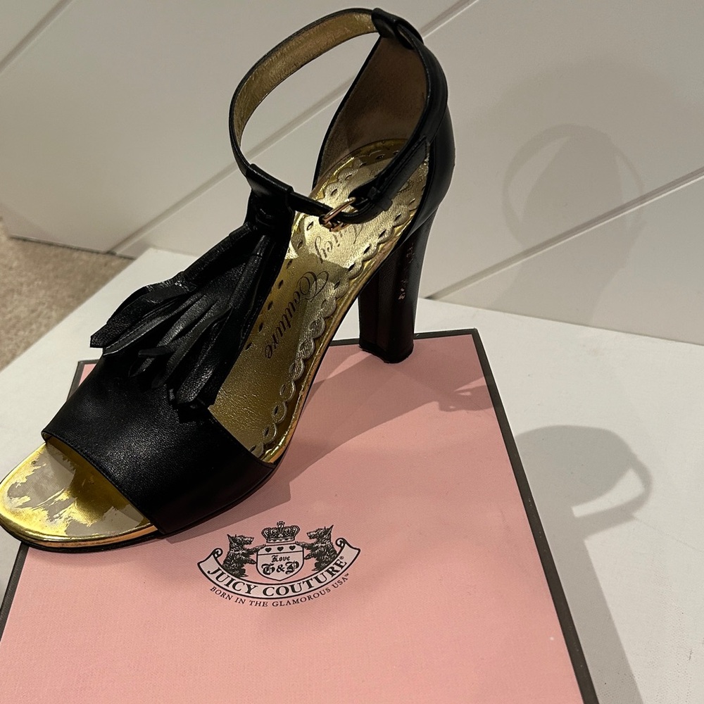 Juicy Couture Black Heels with gold color on the inside.